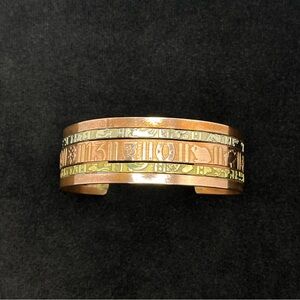 Vintage Handcrafted Copper Alpaca, and Brass Hieroglyphics Cuff Bracelet
